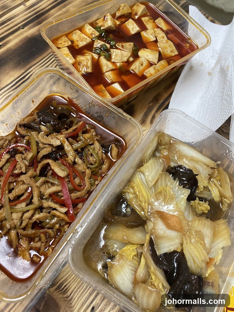 Food containers on wooden table