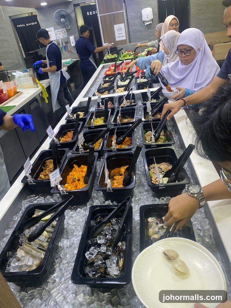 Food buffet counter with customers and staff