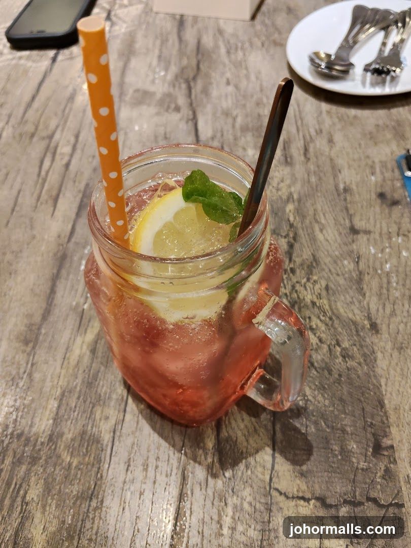 Lemonade in mason jar on wooden table