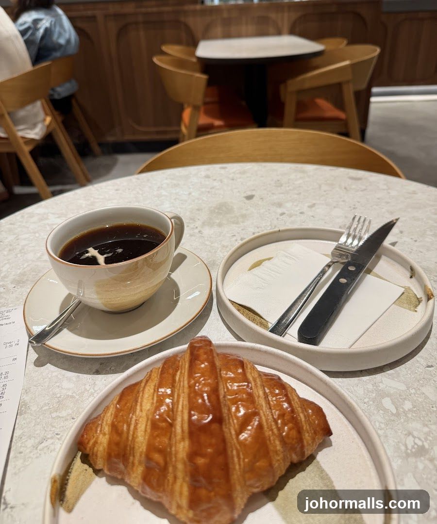Coffee and Croissant at Café