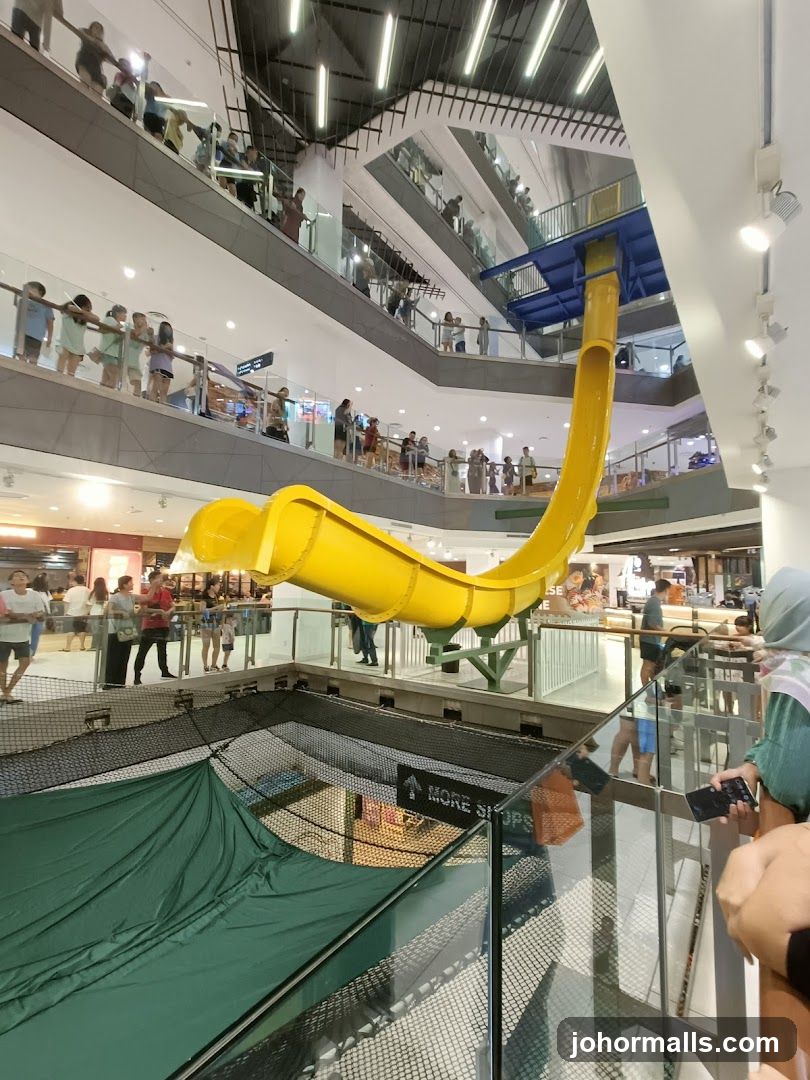Shopping Mall Interior with Water Slide
