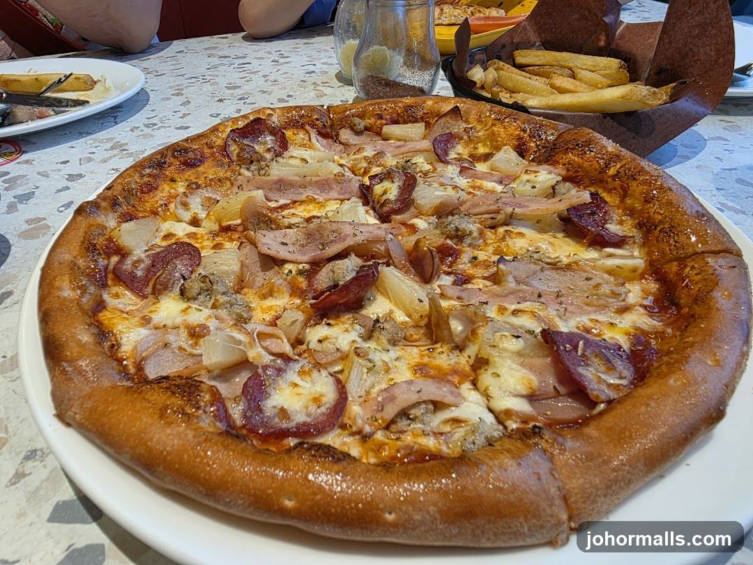 Pizza and Fries at Restaurant