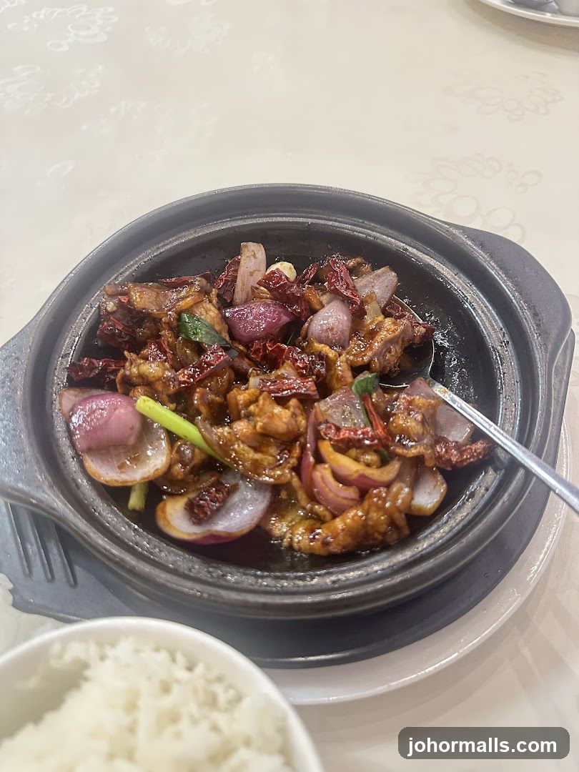 Spicy Stir-Fried Dish with Onions and Dried Chilies