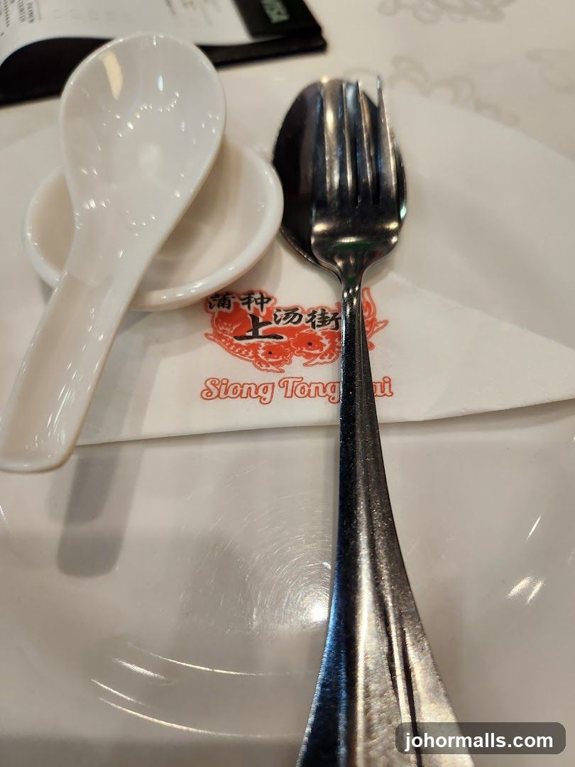 Table Setting with Utensils and Napkin
