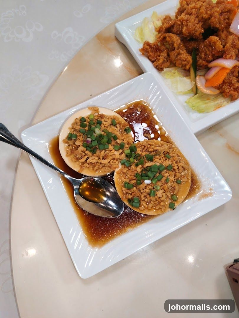 Two dishes of food on a table