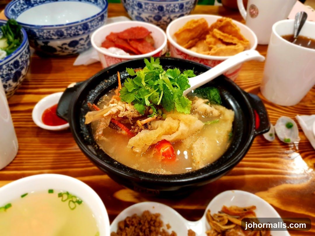 A close-up of a meal with soup and side dishes