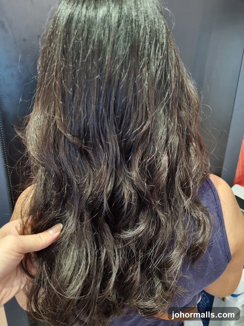 Woman's long wavy dark hair