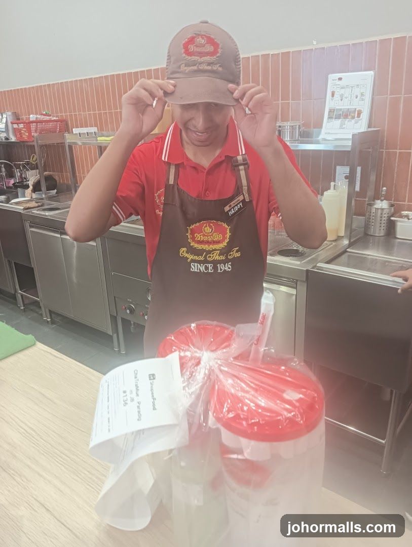 Employee with Thai Tea