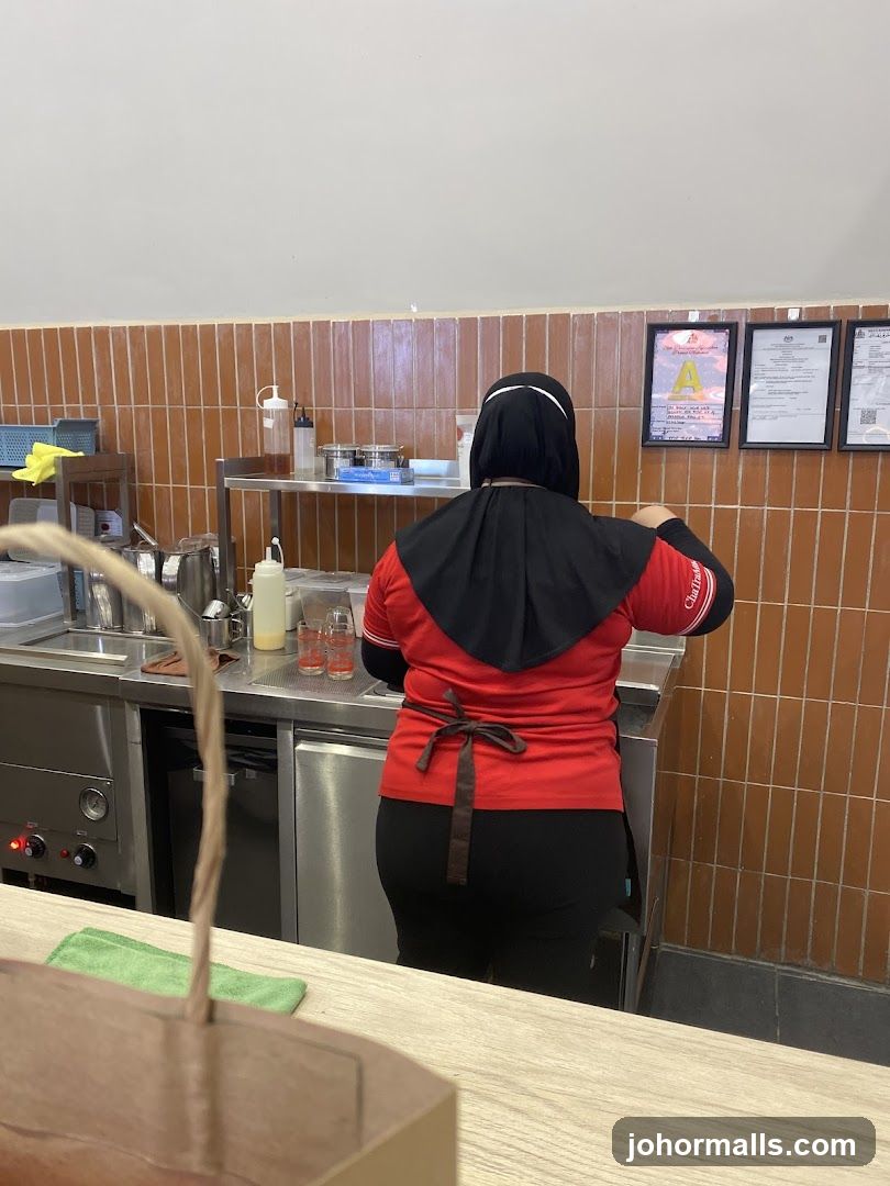 Staff preparing food in a kitchen