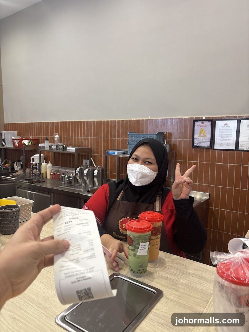 Cashier with drinks