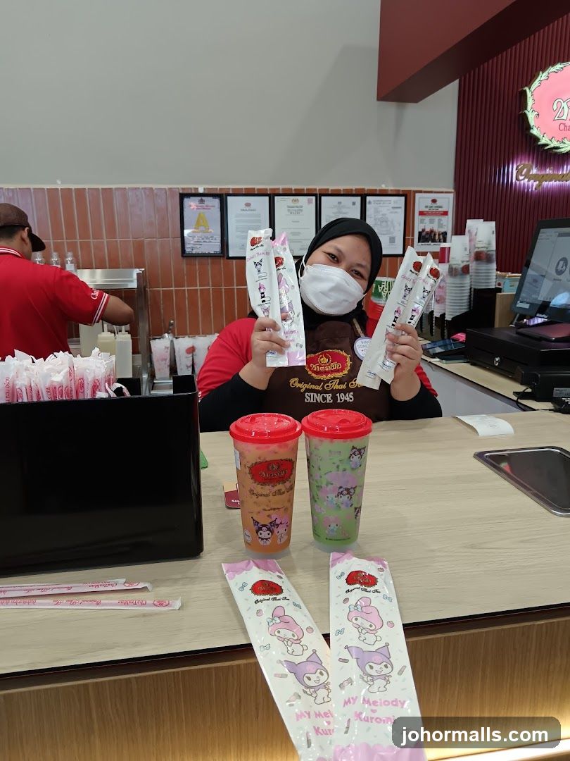 Staff holding promotional items