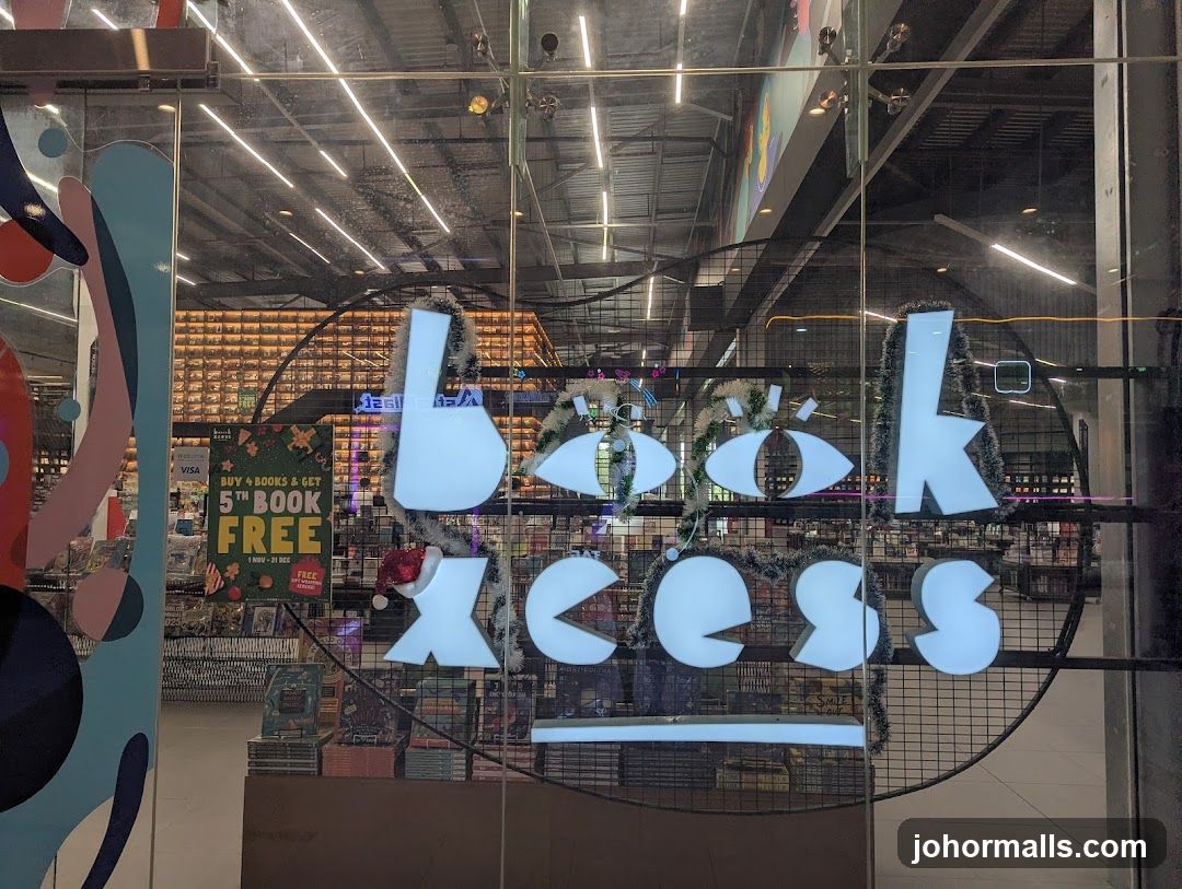 A view through a glass storefront into a book store. The store's name,