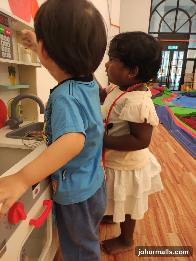 Children Playing with Toy Kitchen