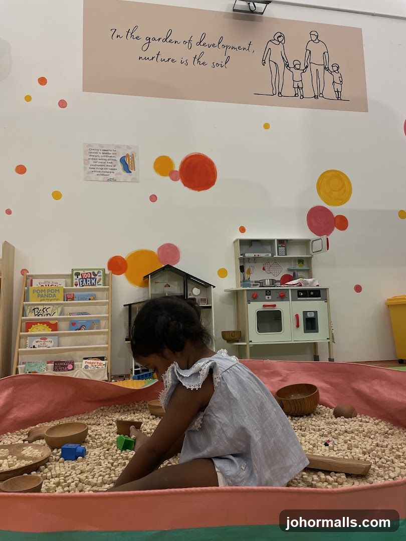 Child playing in a sensory bin