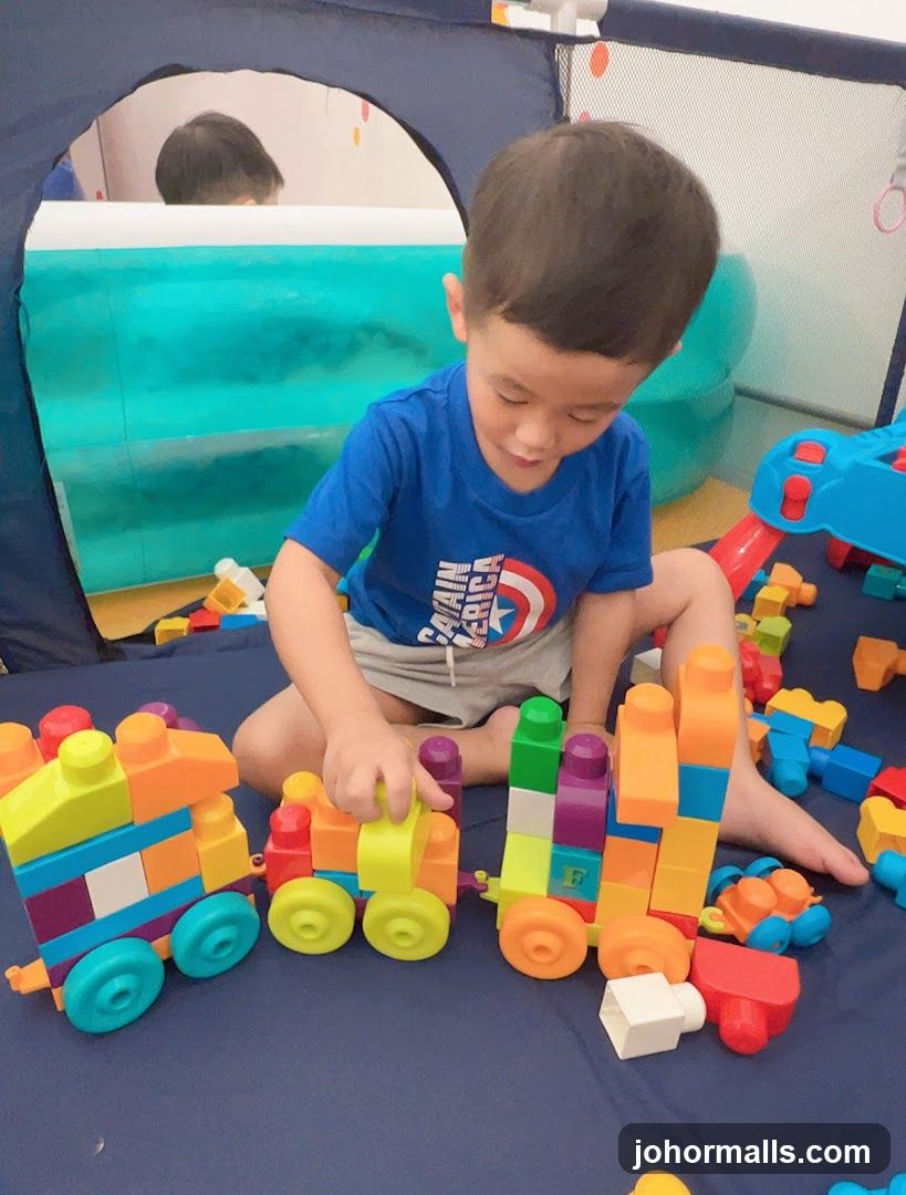 Boy Playing with Building Blocks