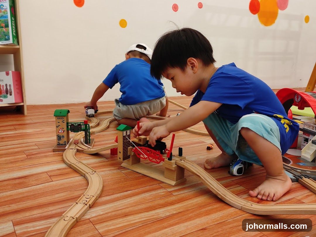 Children Playing with Toy Train Set