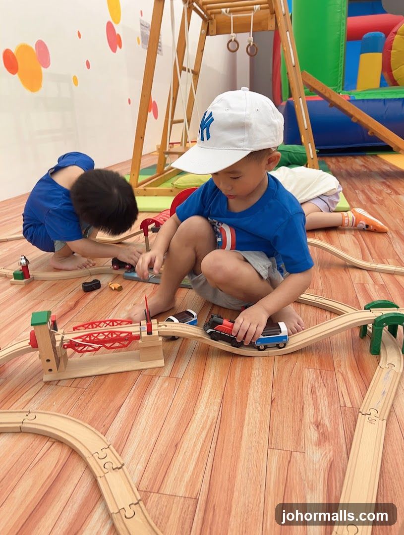 Children Playing with Toy Trains