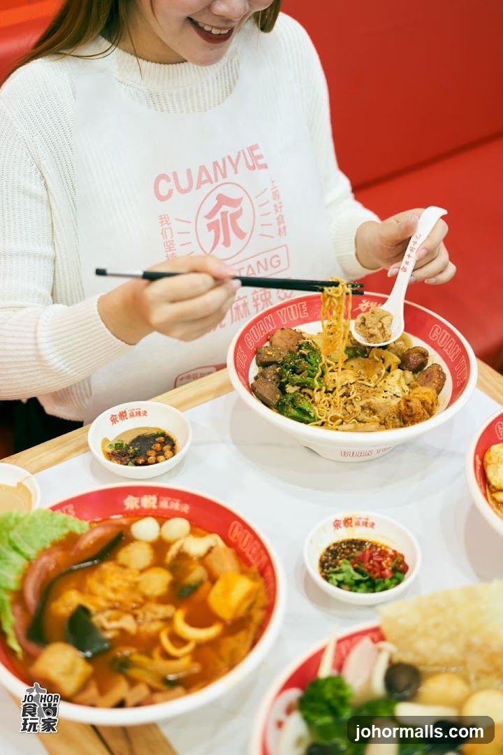 Woman Eating Noodles