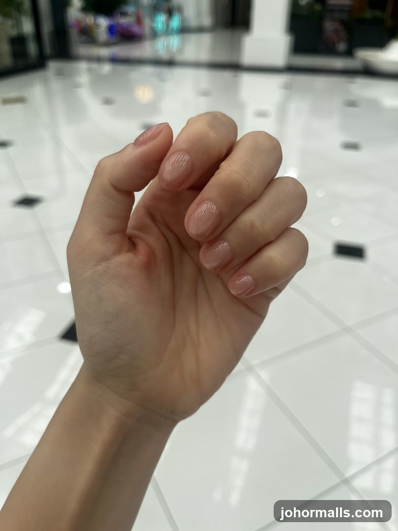 Hand with manicured nails