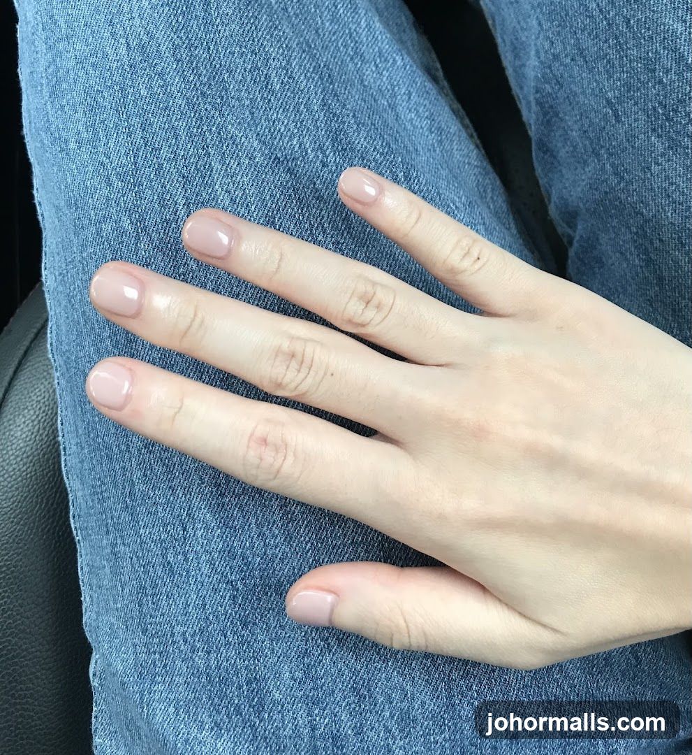 Nails with light pink polish