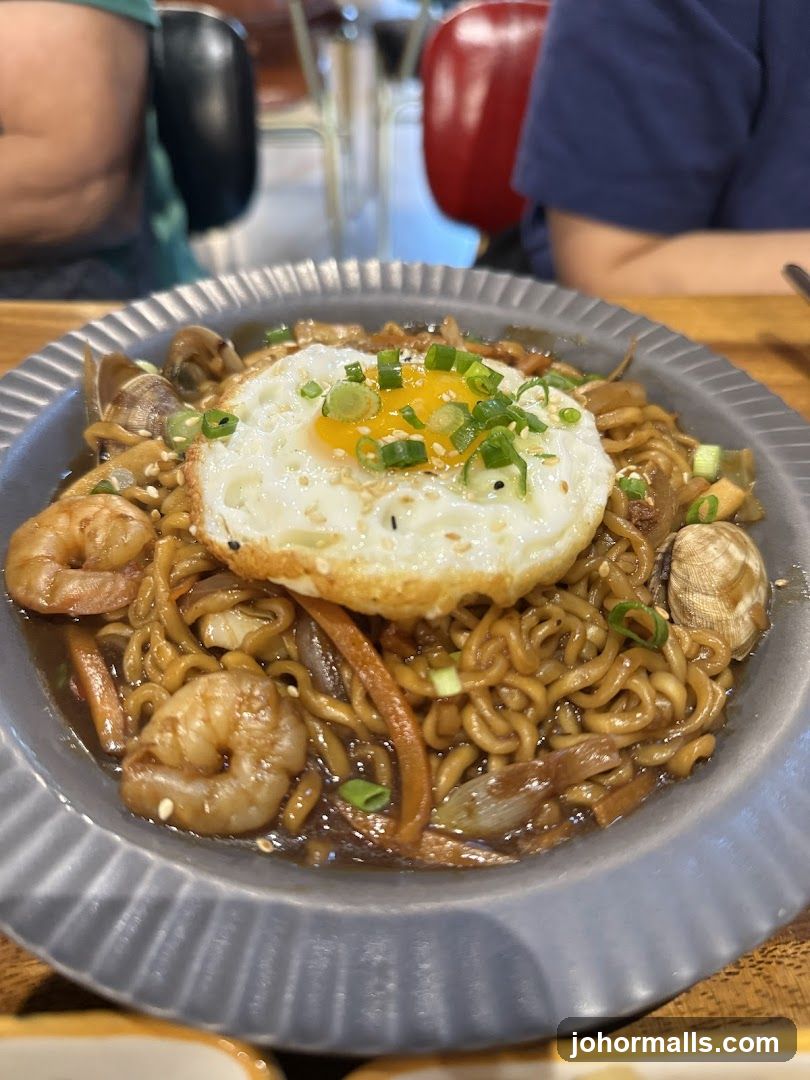 Seafood Noodles with Fried Egg