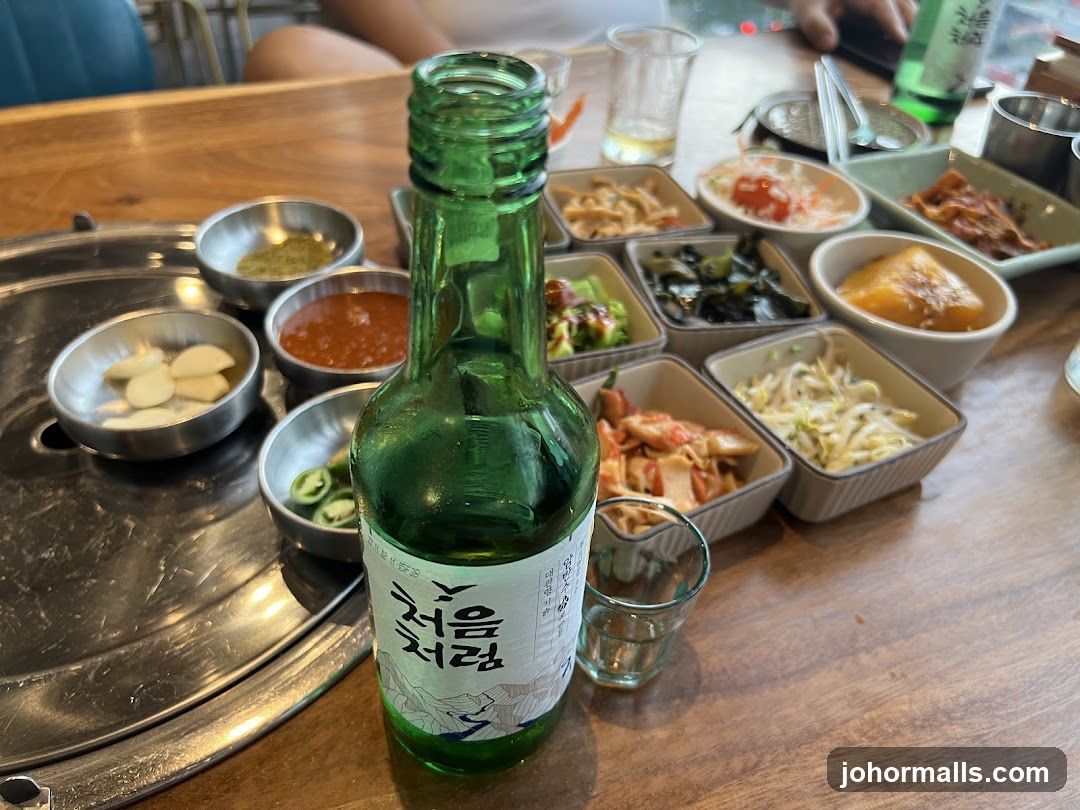 Soju Bottle and Korean Side Dishes
