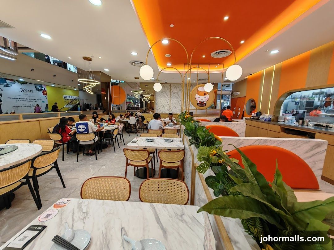 Modern Restaurant Interior with Orange Accents