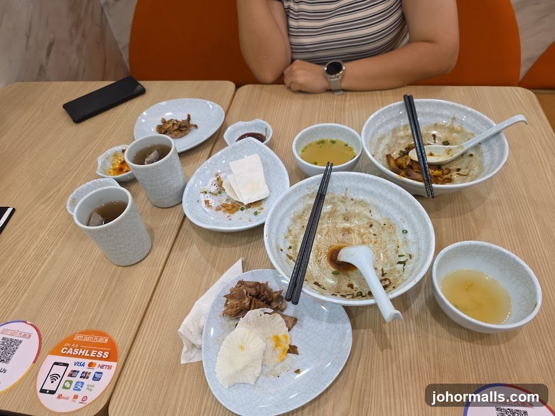 Table with leftover food and drinks