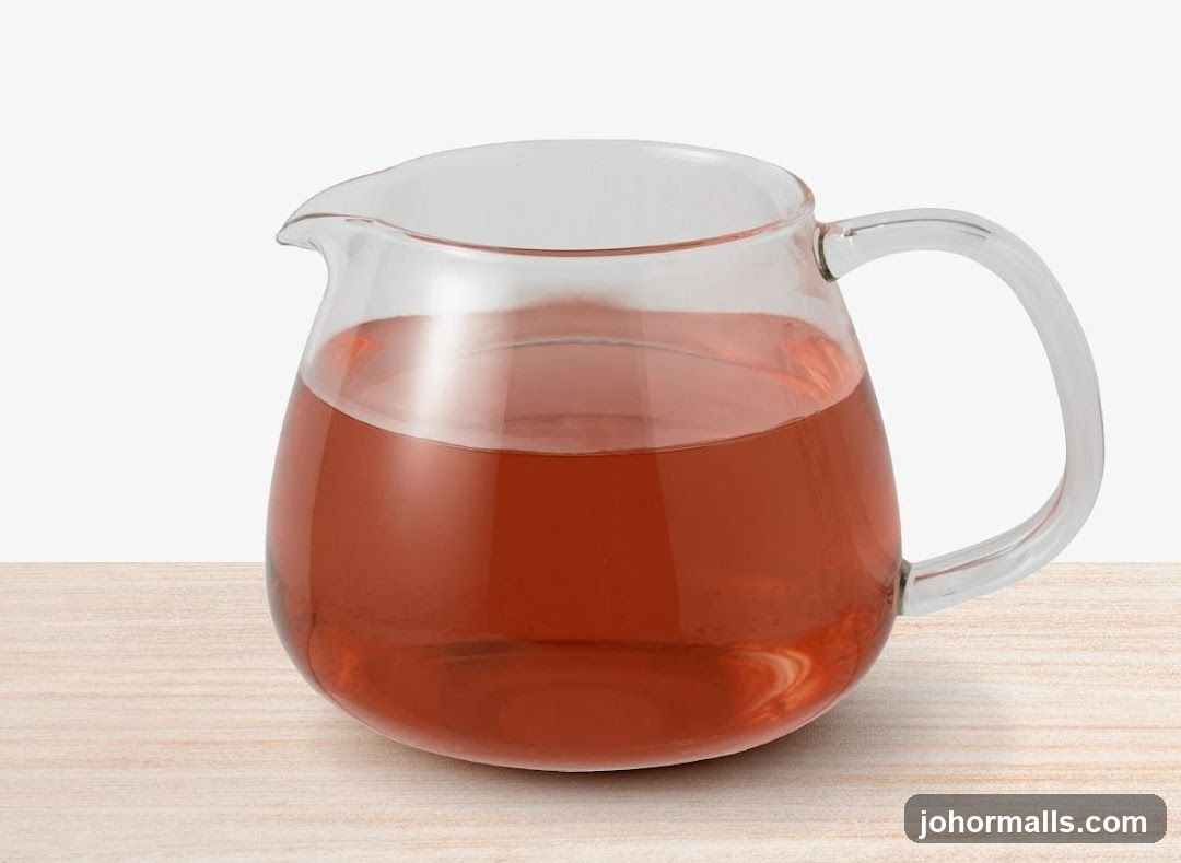 Glass Pitcher with Red Liquid