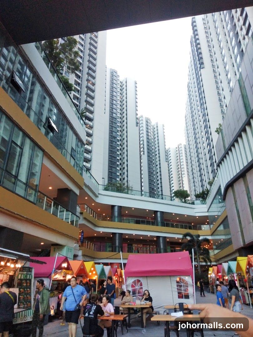 Outdoor Market with High-Rise Buildings