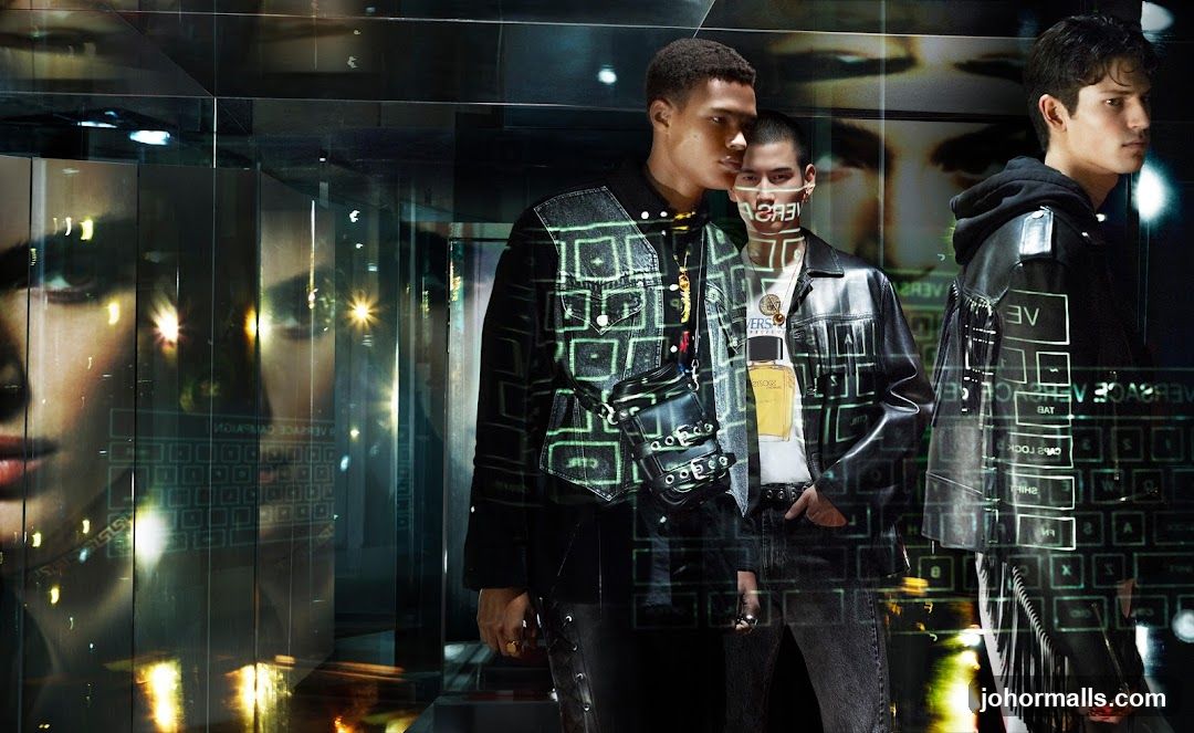 Fashion models in a reflective environment